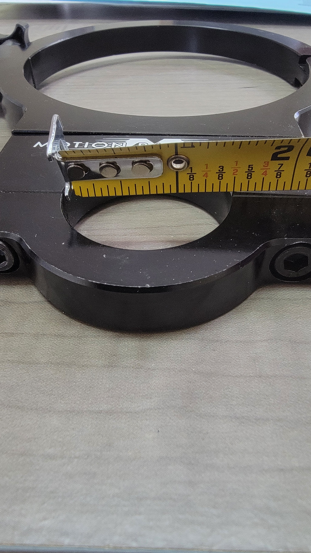 MOTION BOTTLE CLAMP