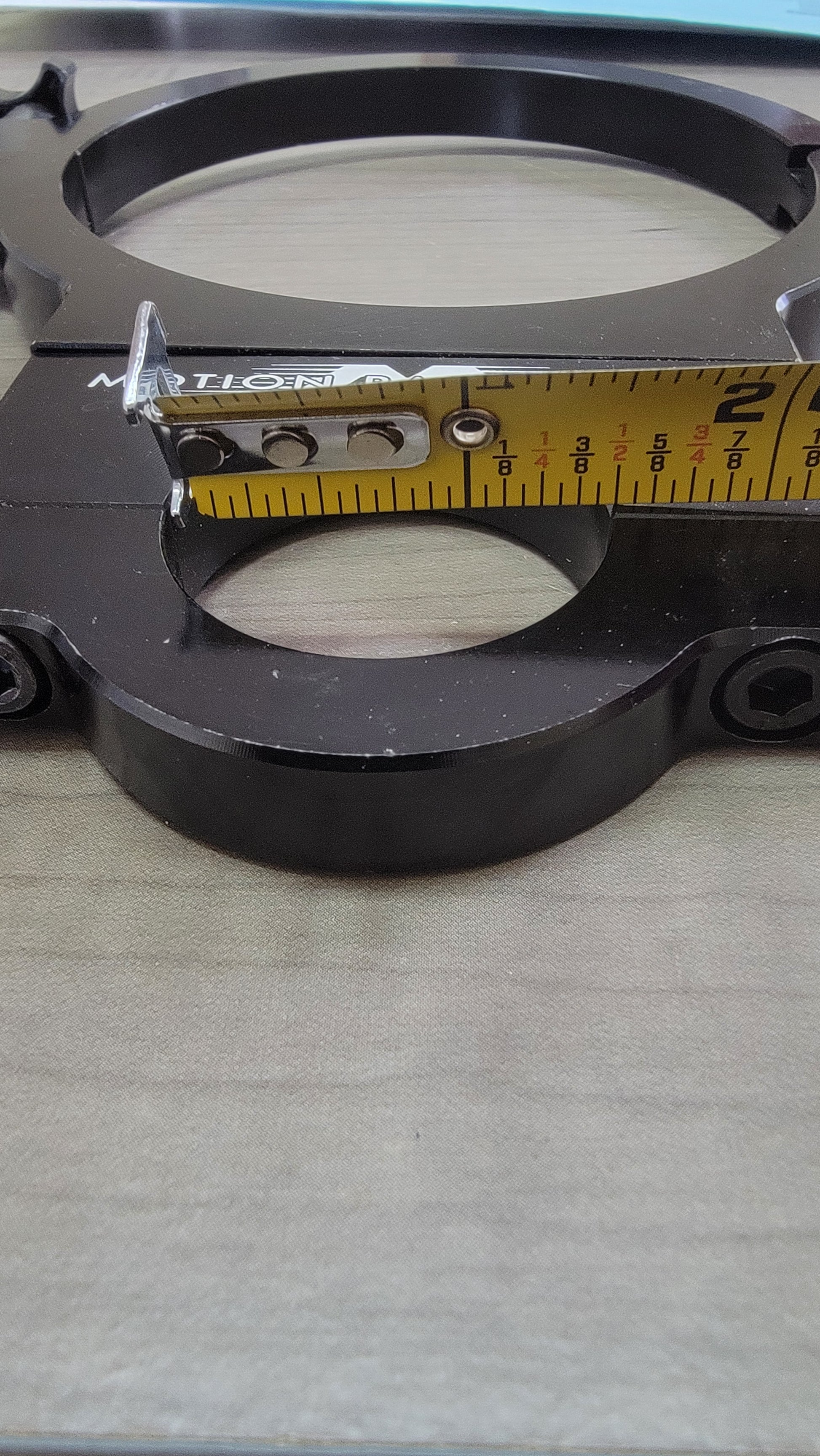 MOTION BOTTLE CLAMP